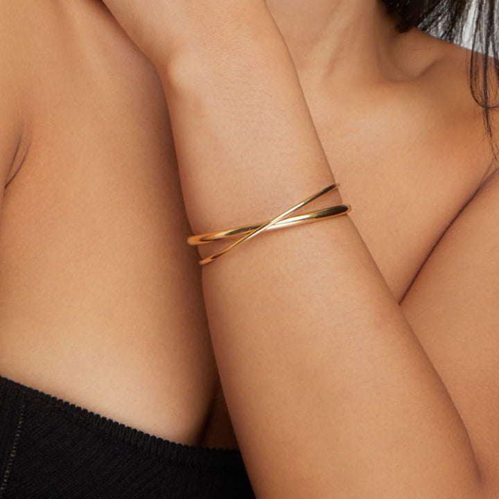 Amelinde | Elegante open gevlochten bangle